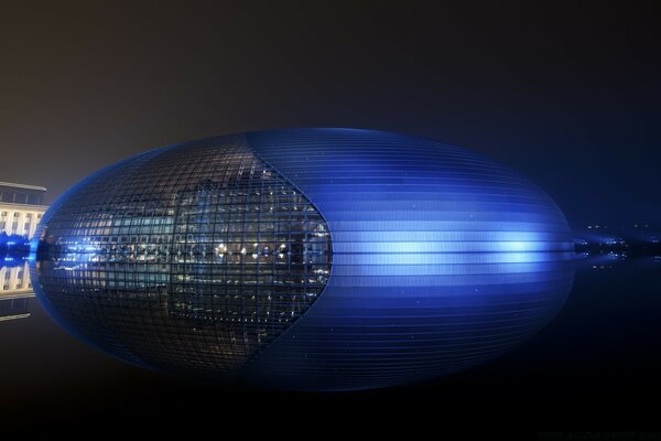 Blue spherical sphere at night