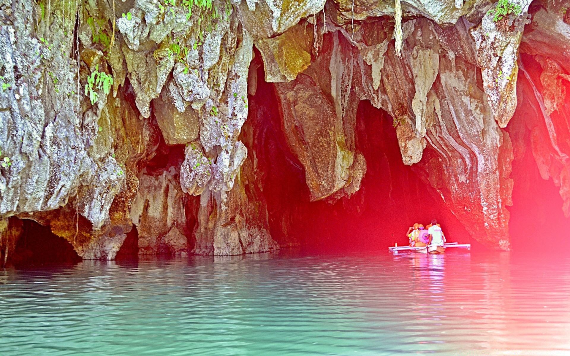 asia cave water stalactite tube grotto travel nature limestone outdoors geology reflection geological formation rock tourism sea light exploration