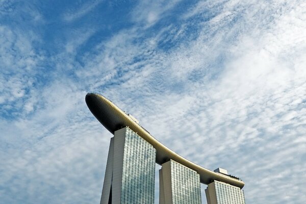 Tall skyscrapers and cirrus clouds