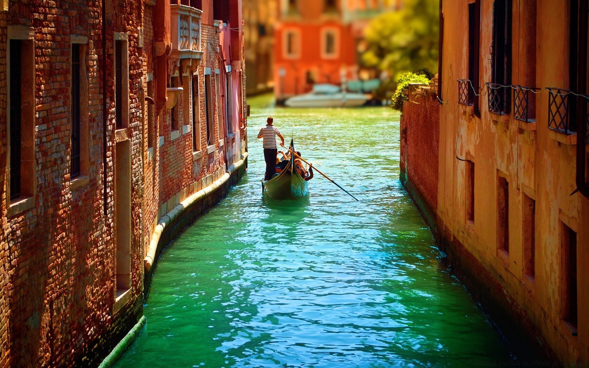 europe canal water gondola travel venetian architecture river outdoors boat gondolier bridge reflection old building city street