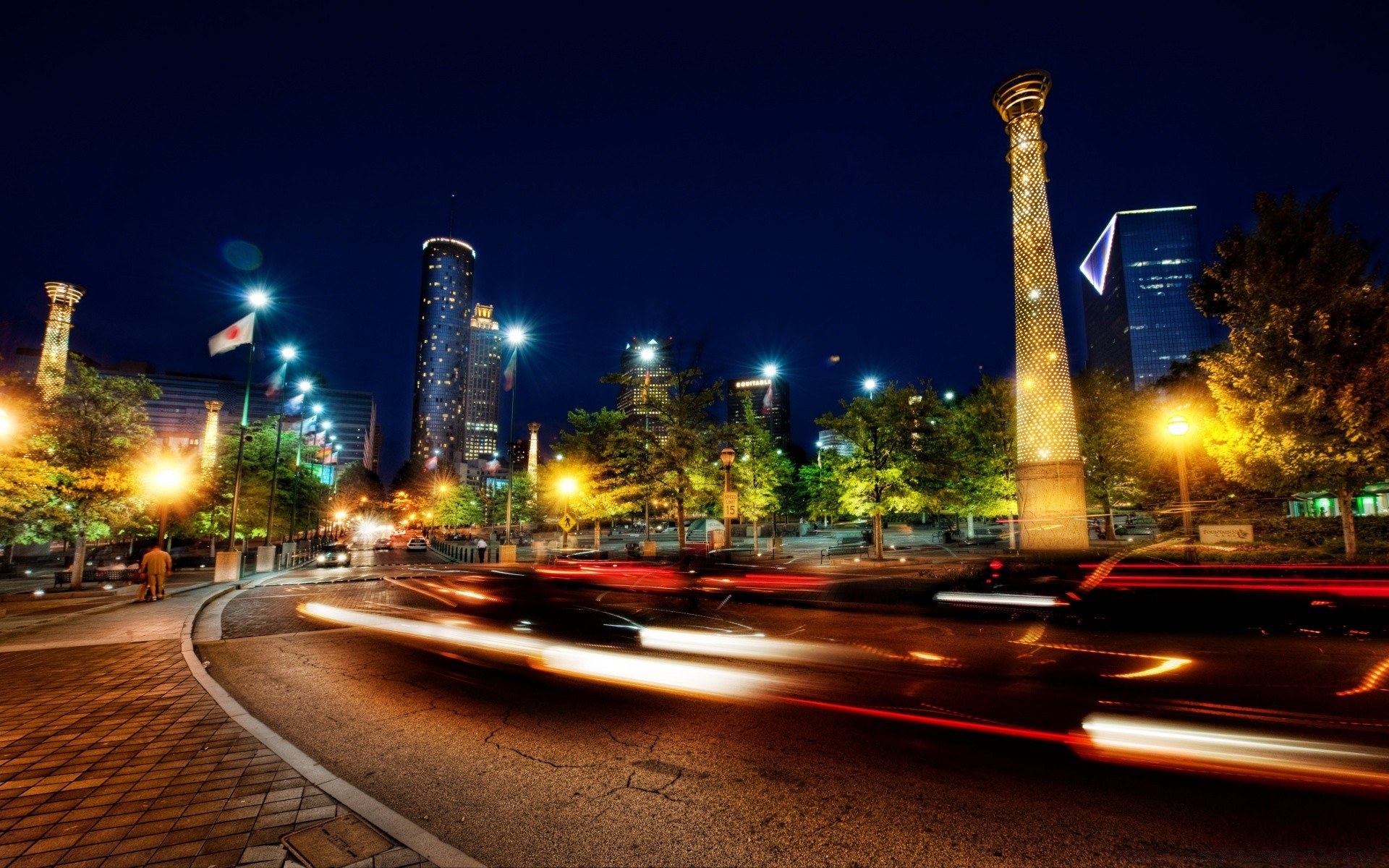 europe street road traffic city car blur downtown dusk urban highway transportation system travel bus light building skyscraper motion evening architecture bridge