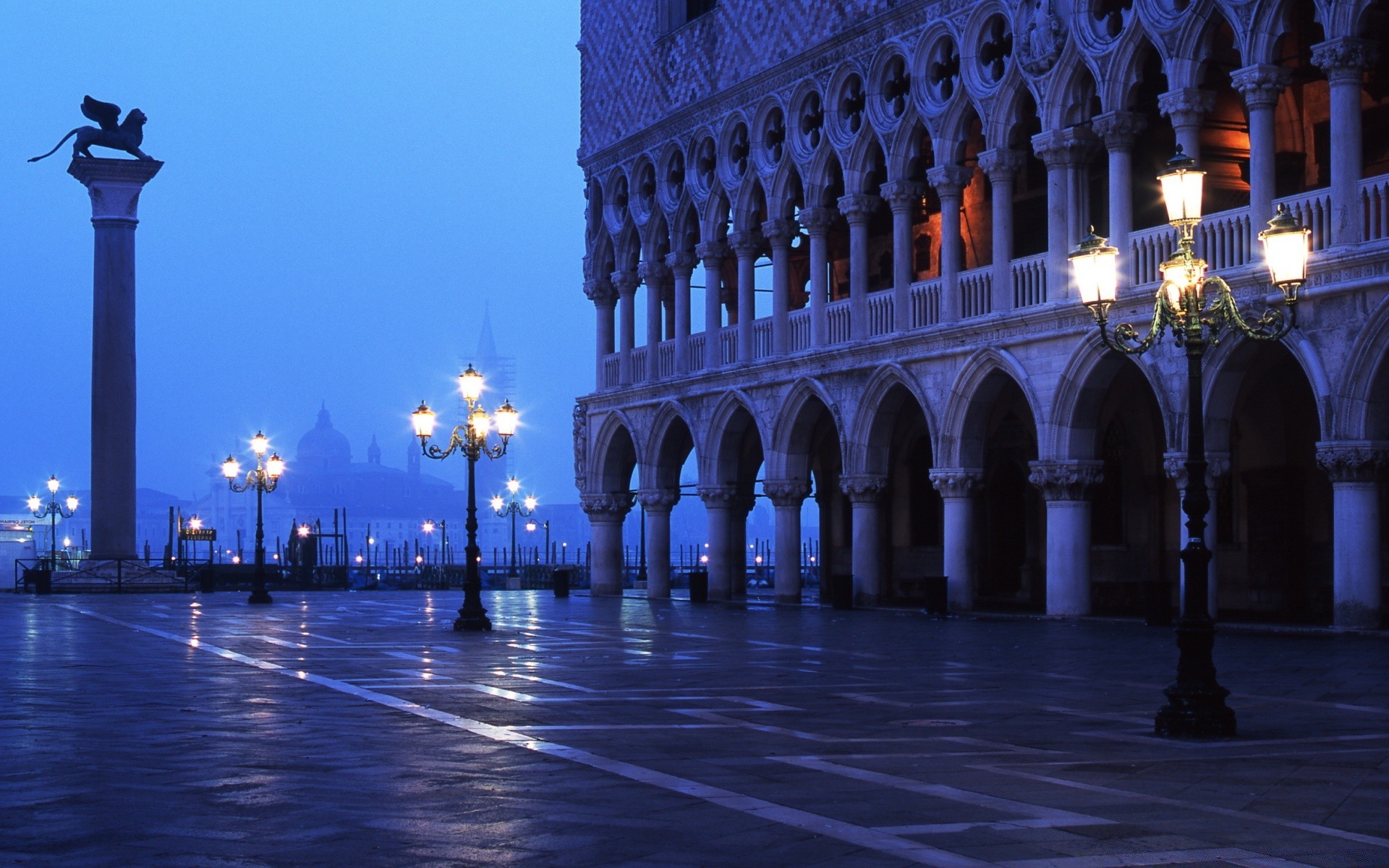 europe architecture travel city building outdoors light evening religion tower sky dusk tourism column