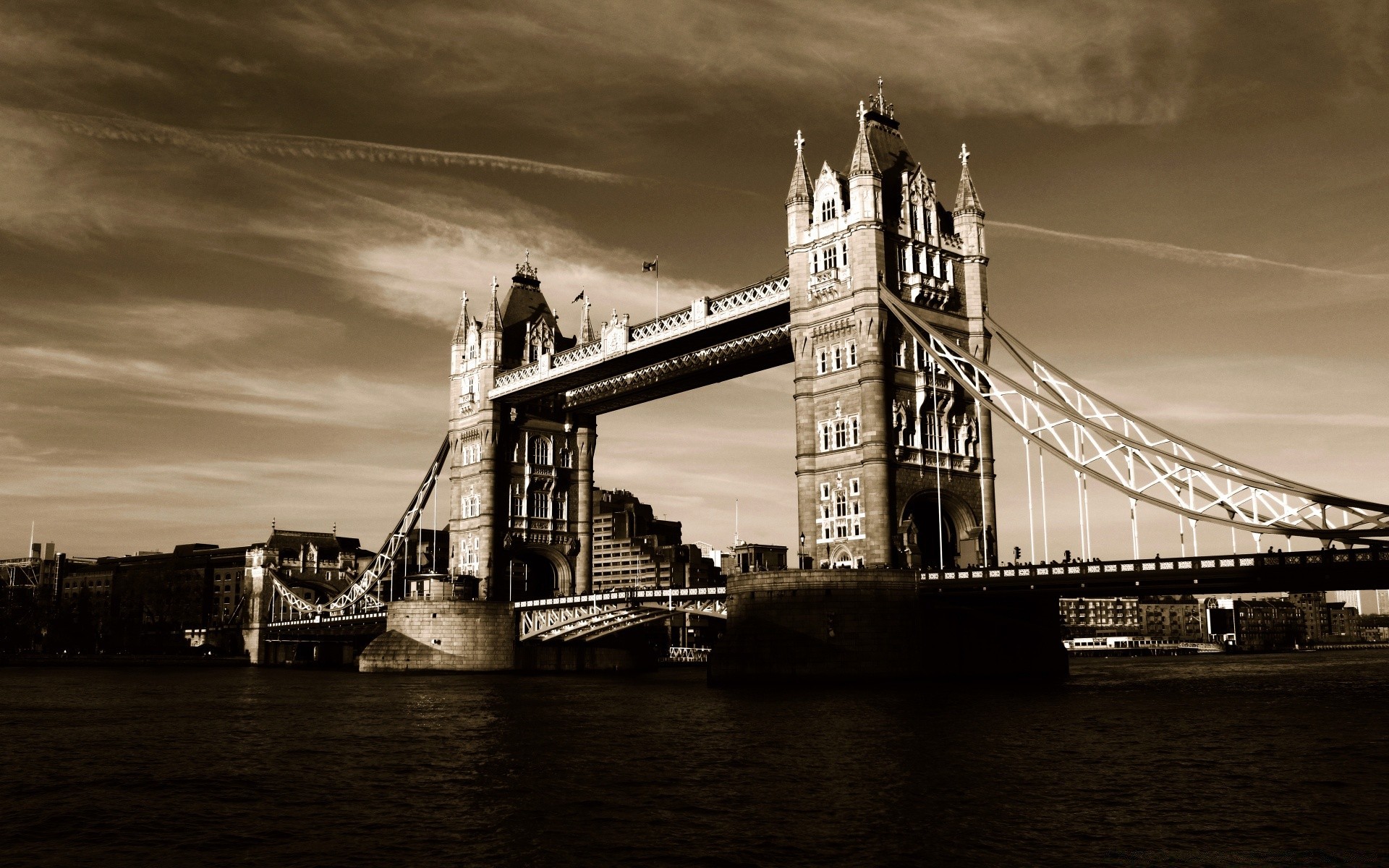 europe bridge river architecture water drawbridge city travel sunset sky tower building suspension bridge transportation system landmark reflection urban