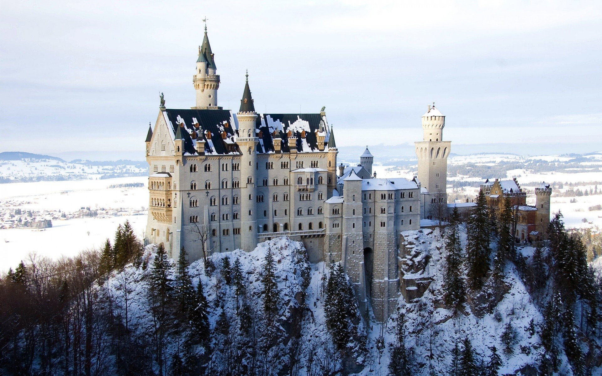 europe architecture winter travel snow building outdoors sky old city castle gothic traditional sight tower town tourism