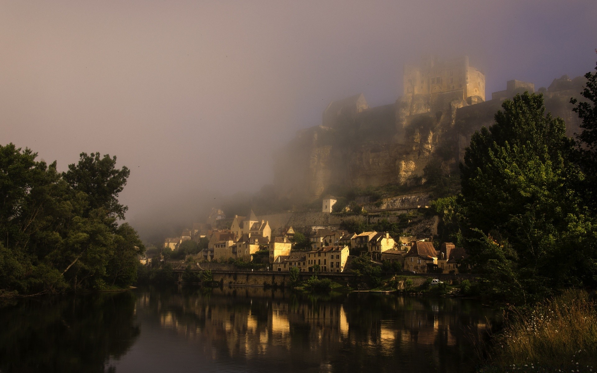 europe fog water river tree dawn city sunset mist landscape reflection travel lake architecture sky evening light outdoors cityscape