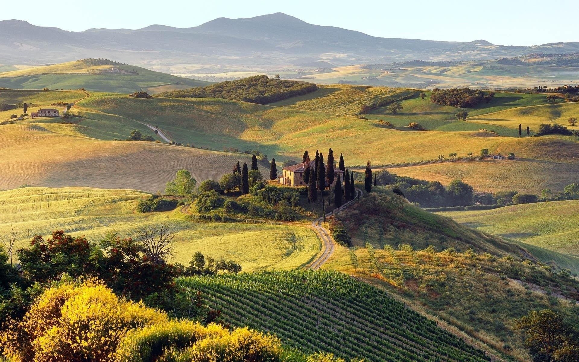 europe landscape hill scenic travel cropland valley nature outdoors mountain agriculture sky field countryside grass grassland farm hayfield rural daylight