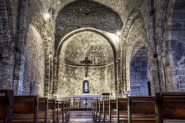 High ceilings in the church with pews