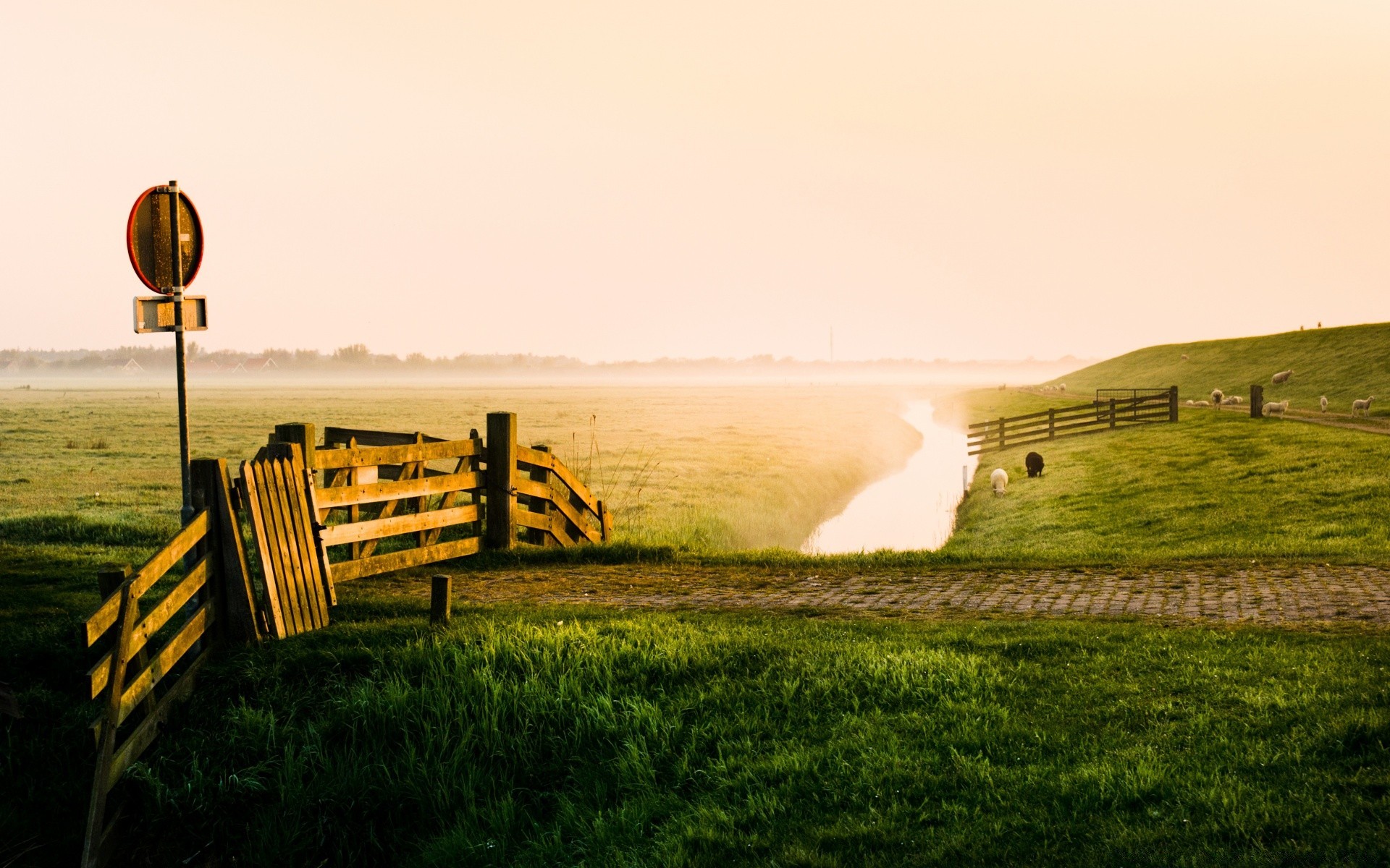 europe landscape field sunset grass farm dawn fence light sky nature country agriculture sun hayfield