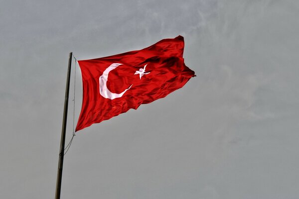 The red flag of Muslims in the wind