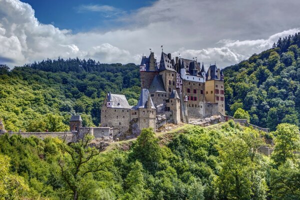 A Gothic castle that stands in the mountains