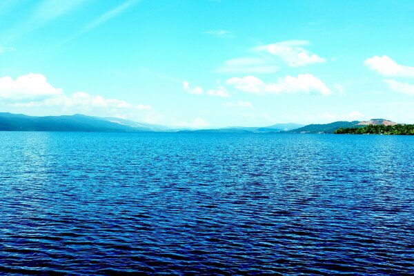 Blue expanse of water and blue sky