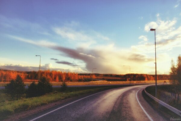 Evening road. Landscape on the highway background