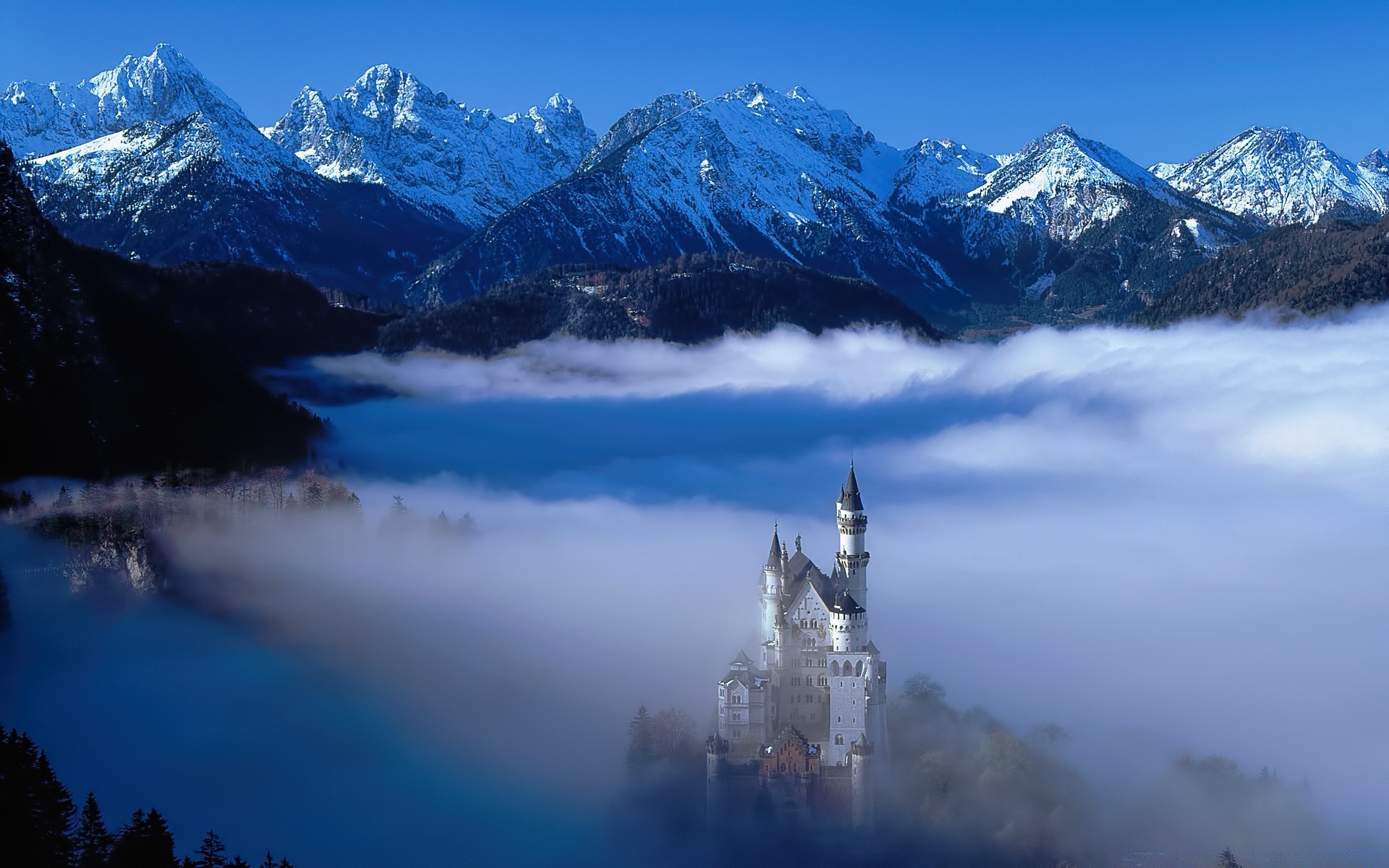europe snow mountain winter travel ice water cold lake fog sky outdoors landscape