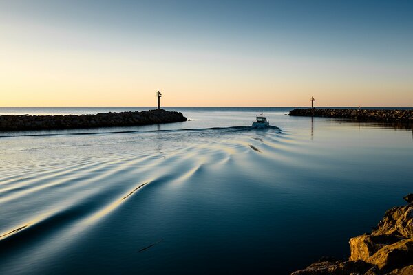 Beautiful waves after a passing boat