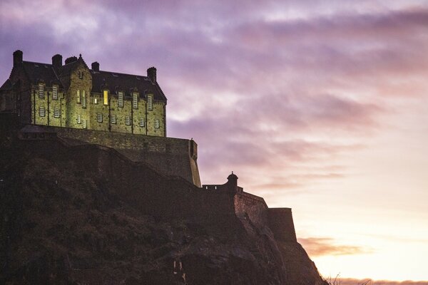 Castle on a hill against the sunset