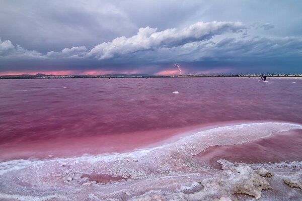 Clouds in the sky hung over the water