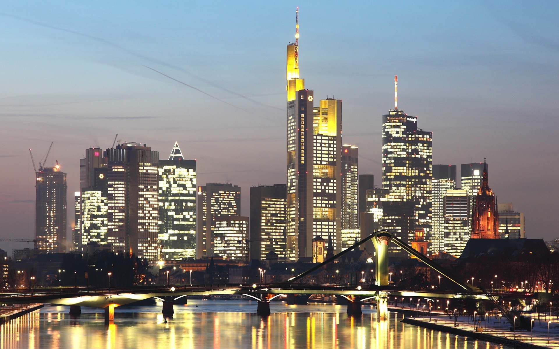 europe city architecture skyline skyscraper travel cityscape dusk downtown building river sky office business water bridge evening modern waterfront tower