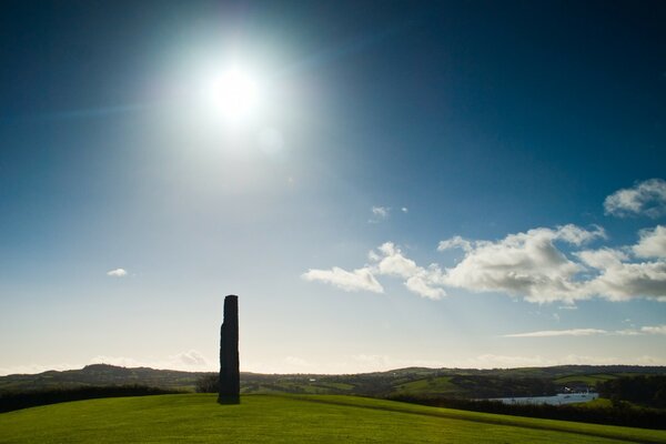 A stone pillar against a light sky background