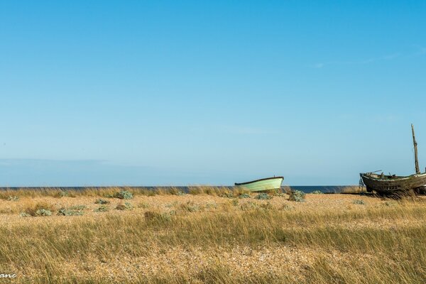 Old boats on the seashore