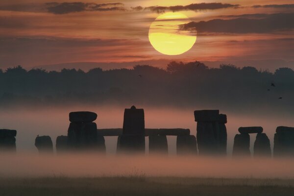 Sunset on the background of ancient architecture