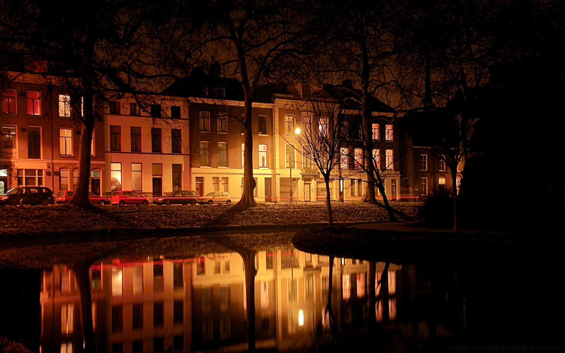 europe water architecture light street house evening city sunset reflection dark old building