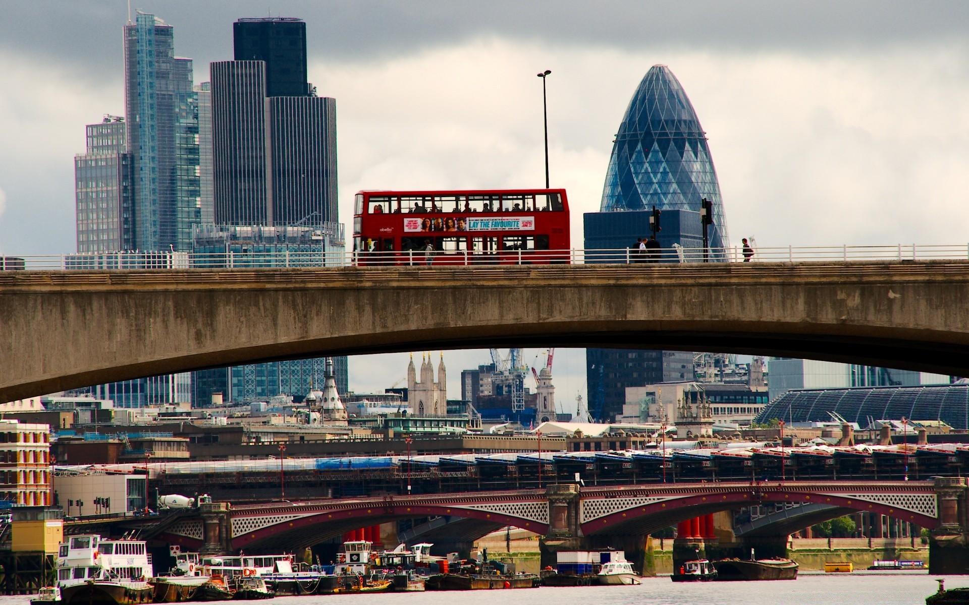 europe architecture city downtown travel skyline cityscape bridge sky skyscraper modern river building traffic contemporary dusk business water outdoors finance