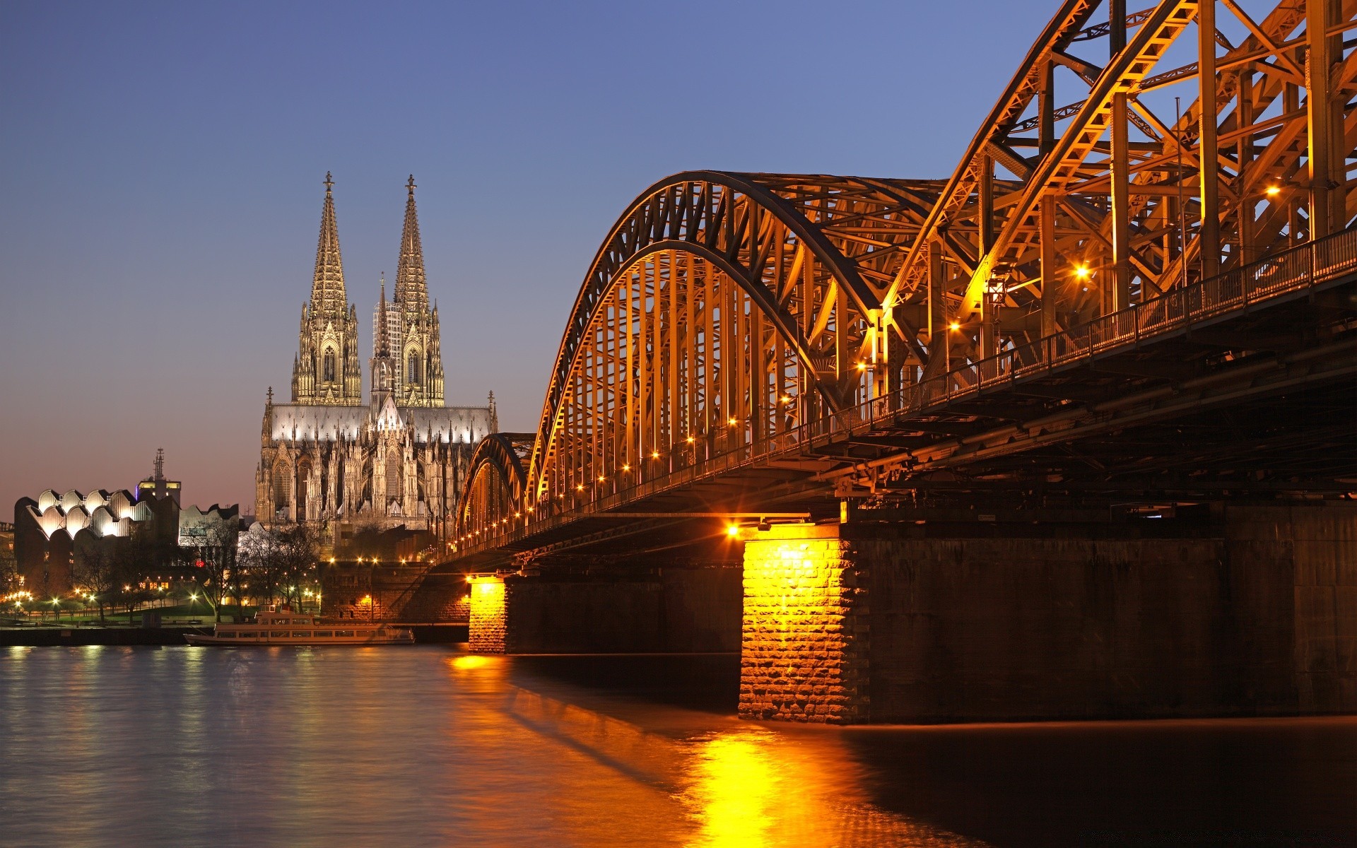 europe bridge river water travel architecture city sunset dusk evening sky reflection building light outdoors urban landmark