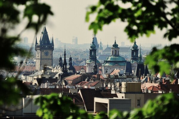 A church and a city can be seen on the horizon