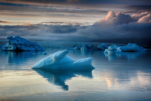 Ice in the ocean on the background of fog