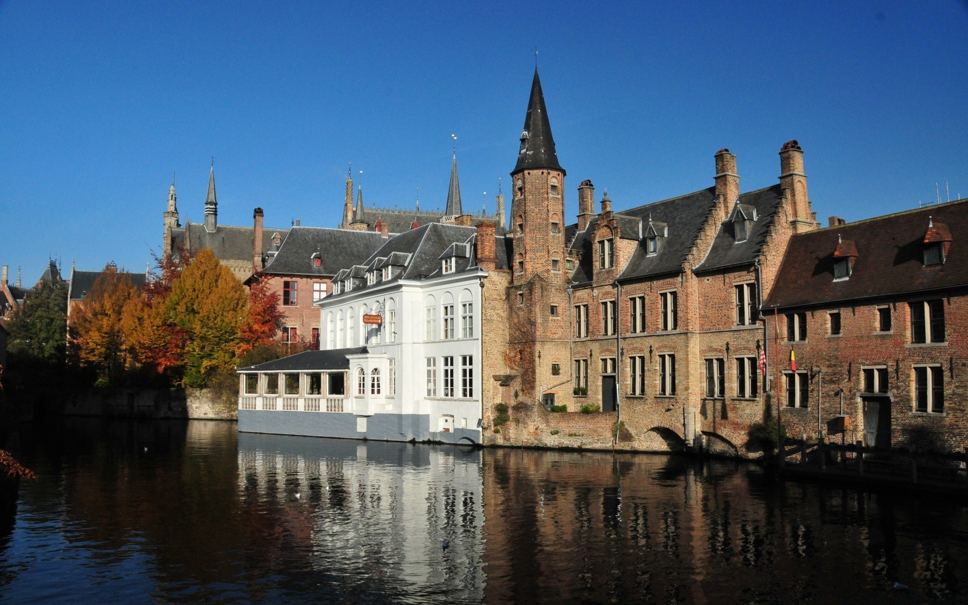 europe architecture river building travel outdoors water home bruges gothic old canal city castle reflection house sky bridge