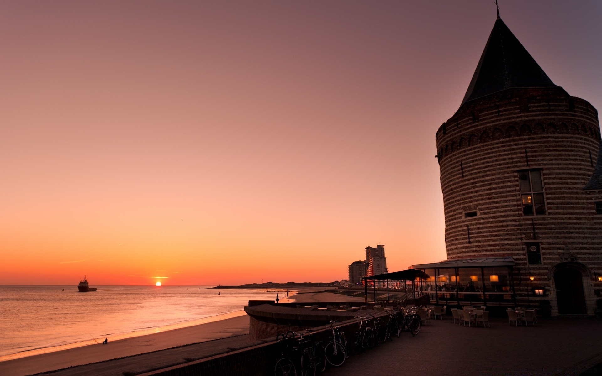 europe sunset dawn water dusk evening architecture travel sun sea city beach sky light outdoors