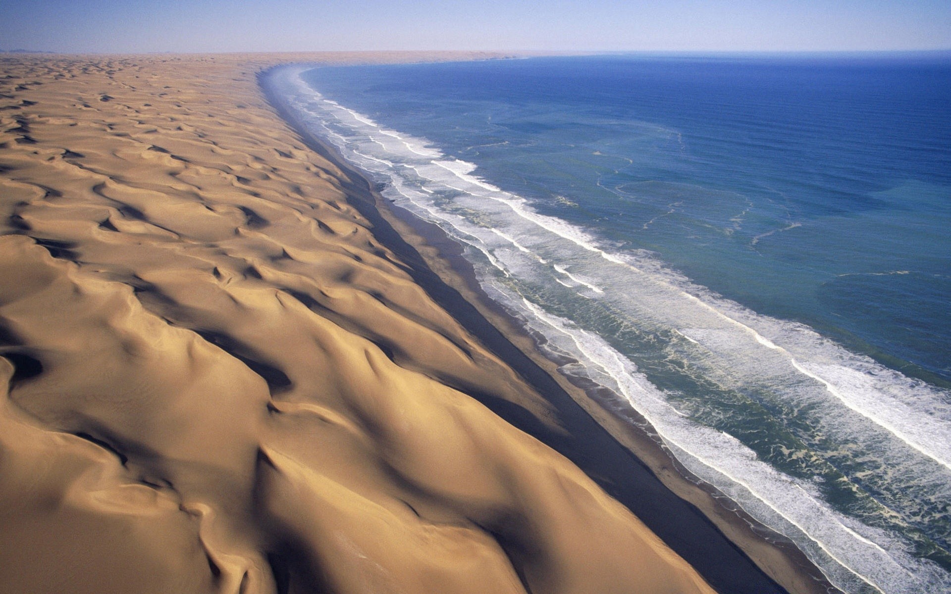 europe plage mer mer océan eau sable voyage paysage ciel paysage vague beau temps nature surf vacances hiver scénique en plein air coucher de soleil