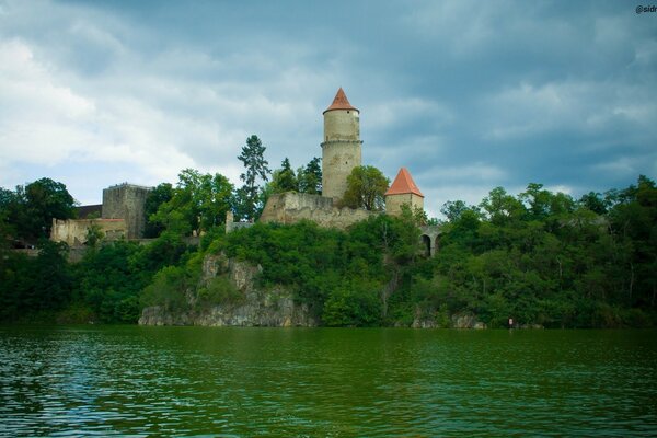 An ancient fortress on a rock above the lake