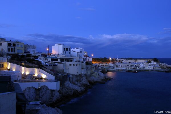 A snow-white city on the shore of the dark sea