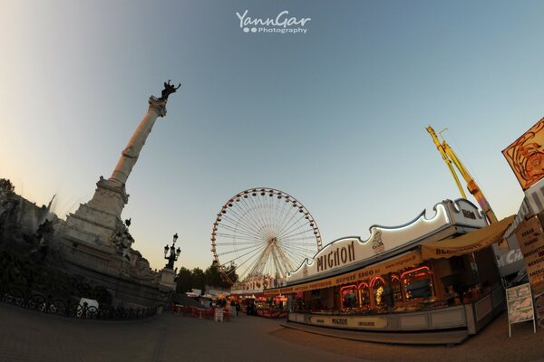 An amusement park in Europe. Ferris wheel