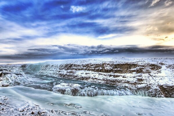 Icy mountains against the sky