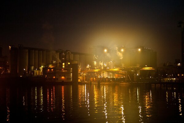 Reflection of night lights in the city river