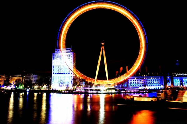 Night city with Ferris wheel