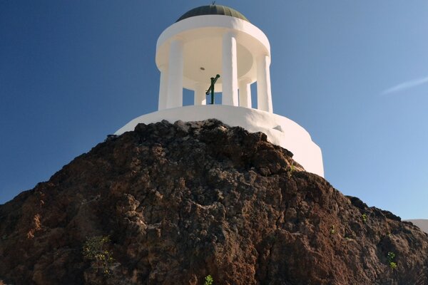 The architecture of the lighthouse against the blue sky