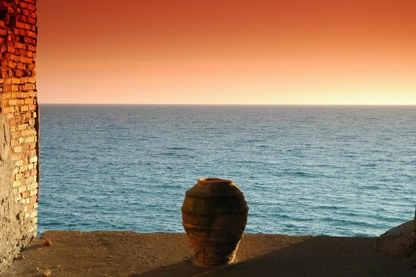 View the sea from the window at sunset