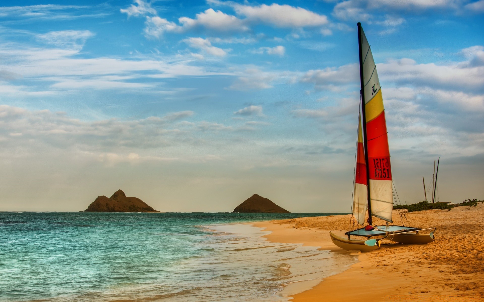 islands beach water sand seashore ocean travel sea seascape leisure surf summer recreation sky sun island outdoors tropical relaxation fair weather