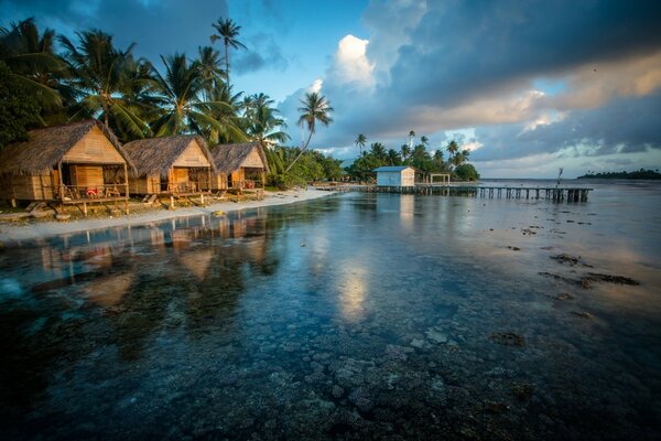 The purest transparent river and huts