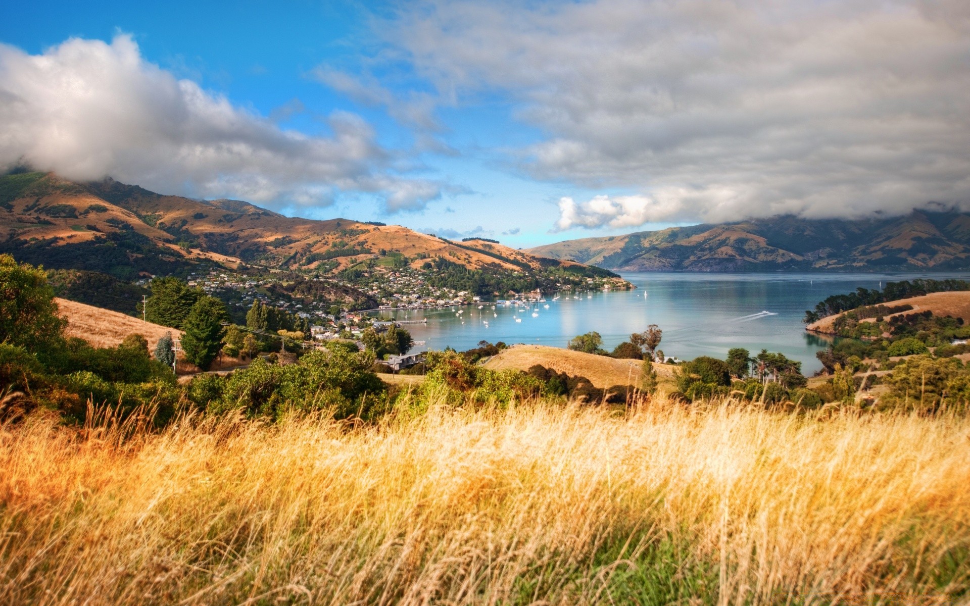 austrália e oceania paisagem natureza viagens água céu ao ar livre montanhas grama cênica lago pôr do sol