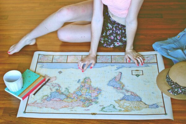 A girl studying a geographical map