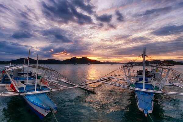 Sea boats on the shore of the bay