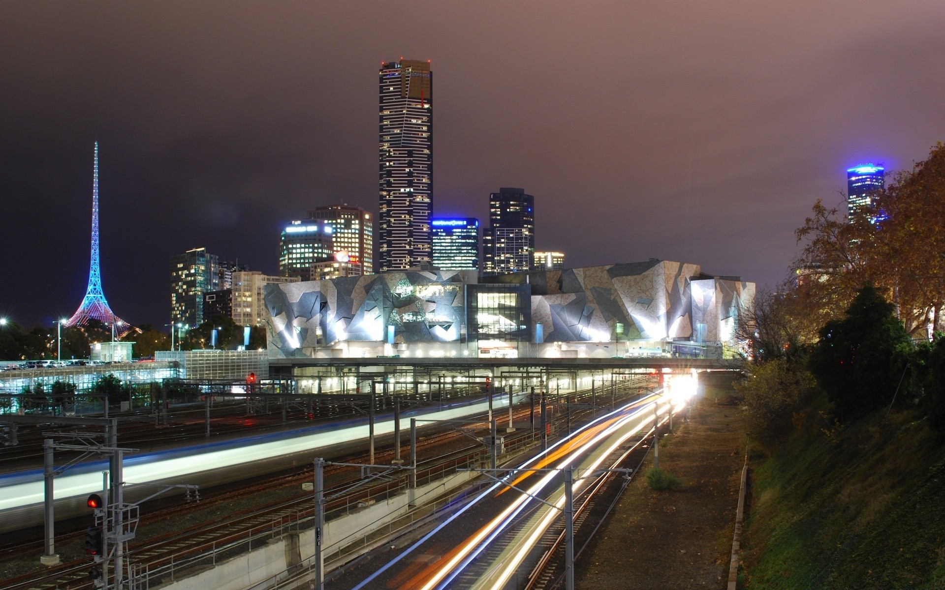 australia y oceanía ciudad carretera carretera viajes crepúsculo rascacielos puente sistema de transporte noche casa ciudad tráfico arquitectura centro de la ciudad skyline urbano desenfoque cielo río calle