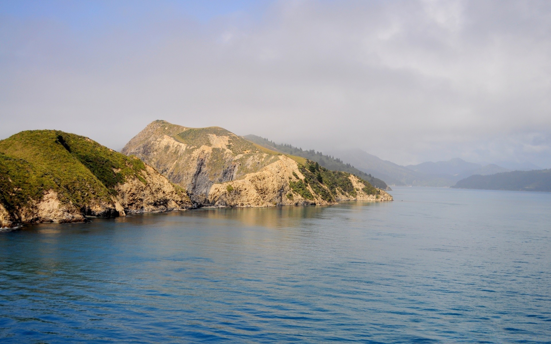 australia and oceania water travel nature landscape mountain sky seashore sea outdoors island summer beach rock