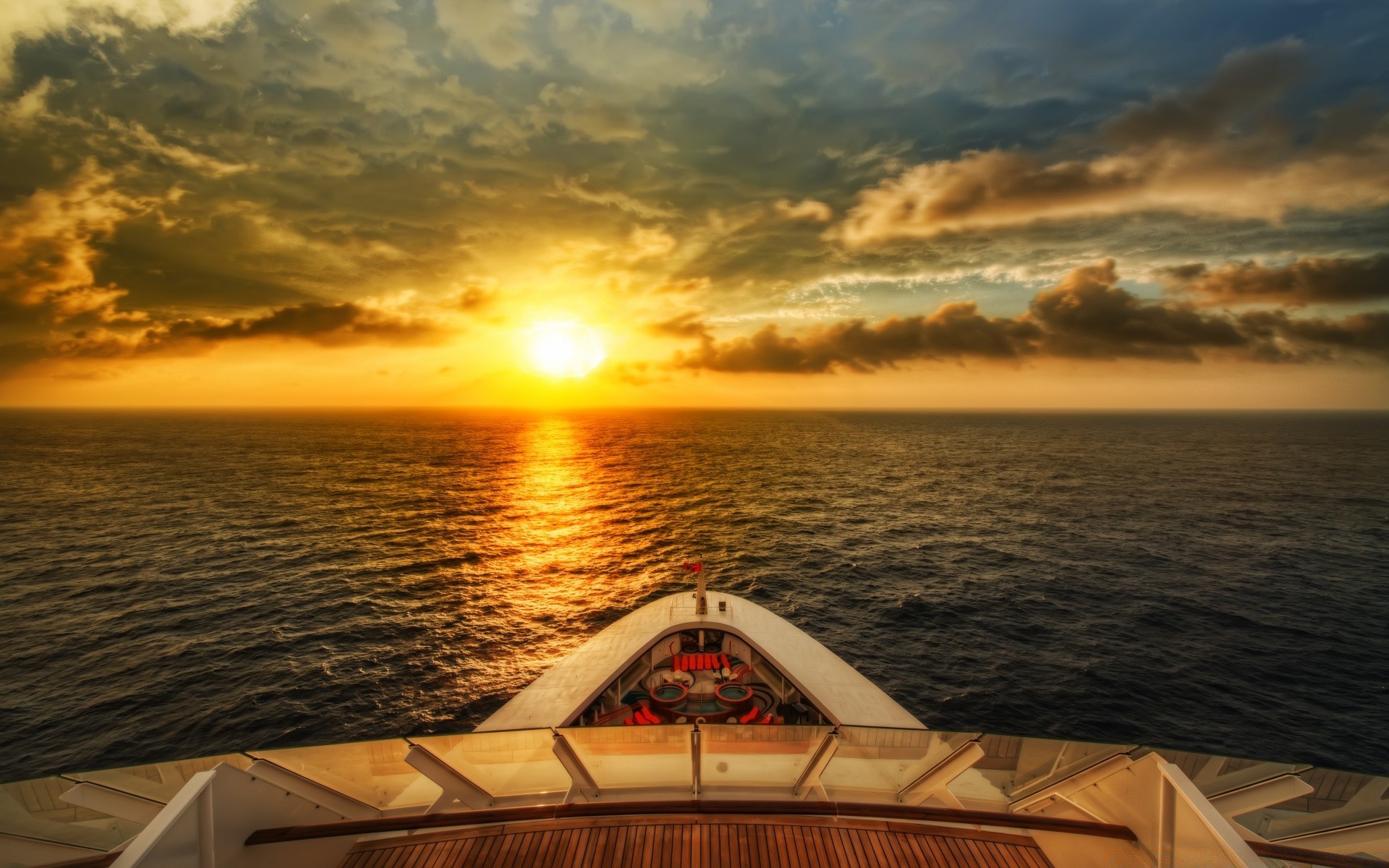 otras ciudades puesta de sol mar agua océano barco sol viajes amanecer playa navegación crepúsculo cielo noche verano sistema de transporte vacaciones vacaciones buen tiempo nube vacaciones