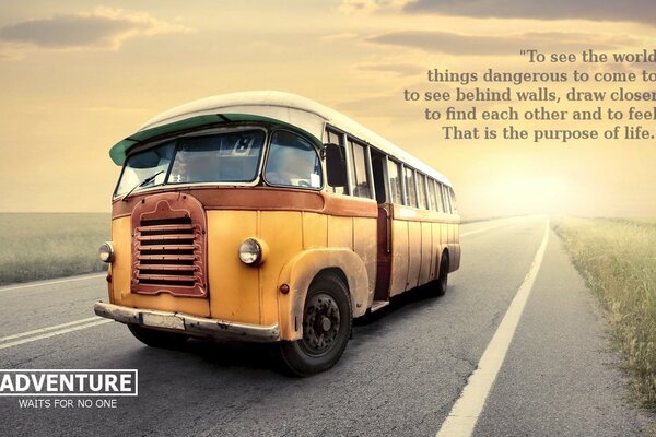 An old bus on the highway against the background of the morning sky