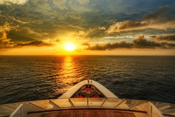 Yellow sunset on the background of the sea